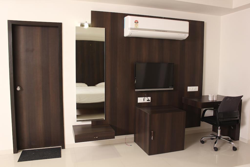 Hotel Magnum Inn Джунагадх Номер фото